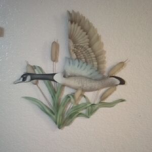 Graceful Bird Wall Art with Green and Brown Accents